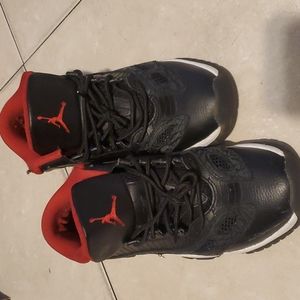 Jordan 11 Retro low size 7y black and red